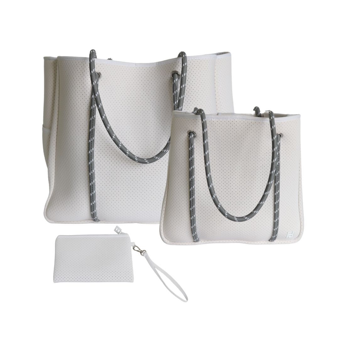 Five Love Courtside Racket Tote set in white neoprene with large bag, small bag and wristlet.